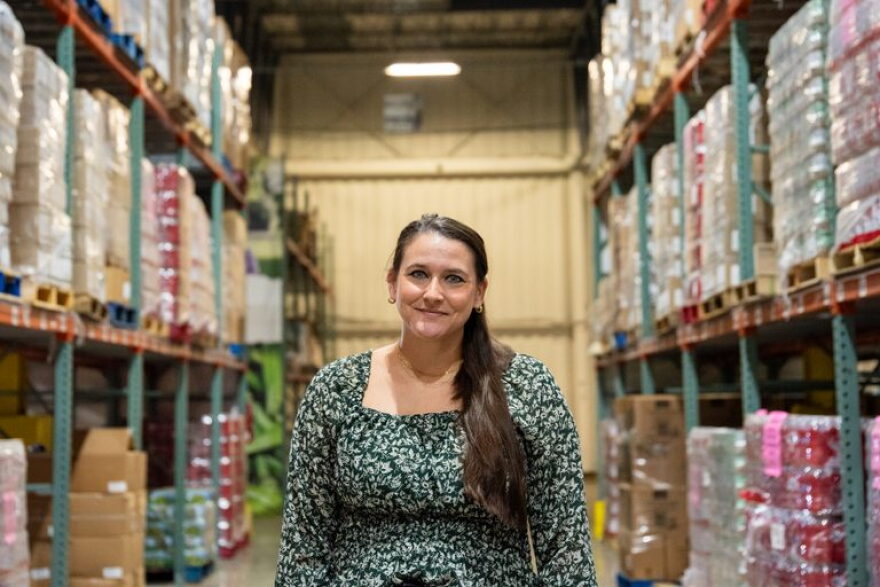 Lindsay Hendrix, chief impact officer for Second Harvest Food Bank of South Louisiana, poses in the food bank’s warehouse in Elmwood, La. on Aug. 4, 2026. She said food insecurity has increased and the food bank has seen people visit more frequently than past years.
