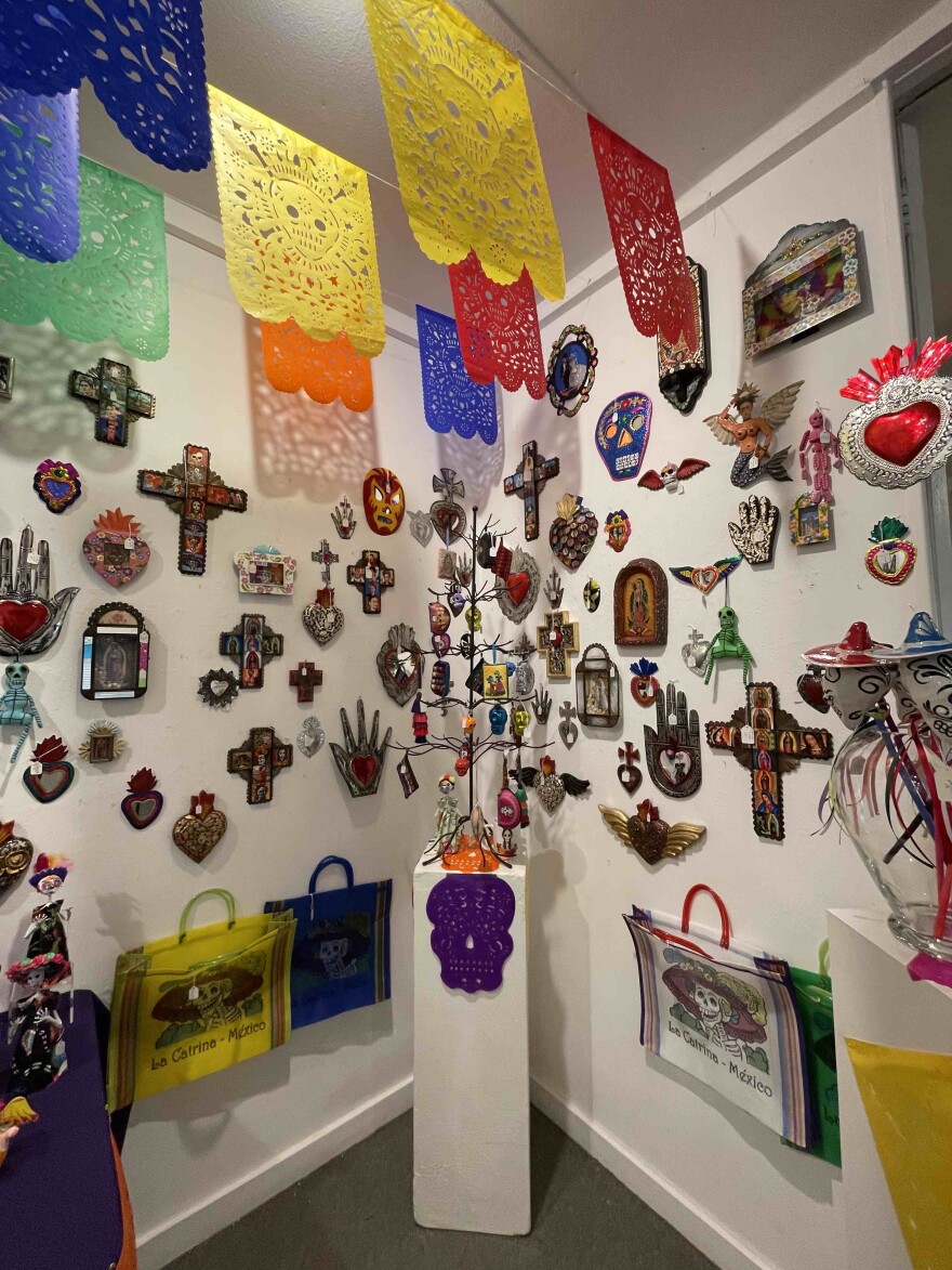 The Maude Kerns Gift Store has taken down the Day of the Dead merchandise and is busy replacing it with art of all kinds for holiday shoppers and appreciators.