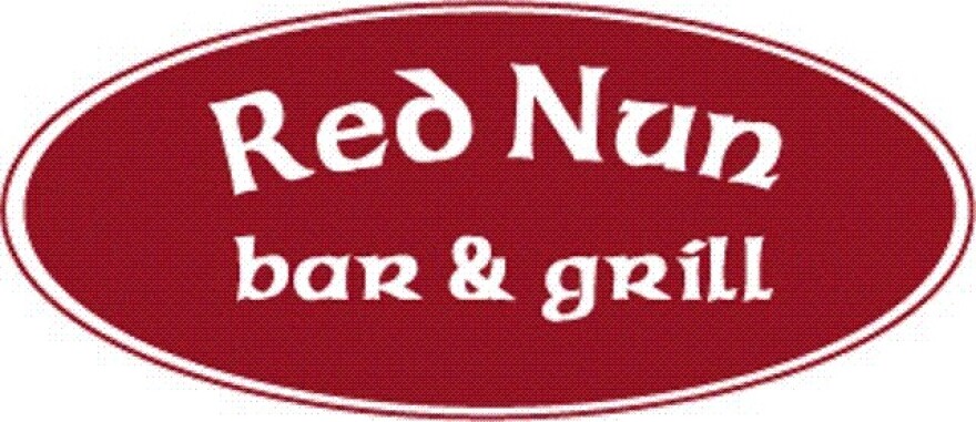 Red Nun Bar and Grill logo featuring those words in white on a red oval.