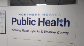 Text on a wall that reads "Northern Nevada Public Health, Serving Reno, Sparks, and Washoe County"
