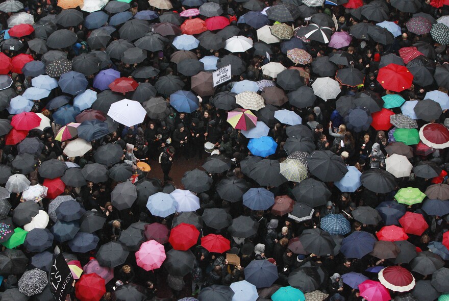 A sea of umbrellas fill downtown Castle Square in Warsaw, Poland, on Monday, as thousands of women and men participated in a nationwide "Black Monday" strike to protest a legislative proposal for a total ban on abortion.