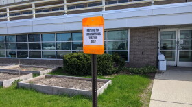 Testing Site Sign That Reads, "Parking for CORONAVIRUS testing only."