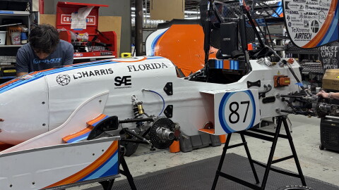 Gator Motorsports members testing ideas on last year's Formula-style race car in the team’s shop at the University of Florida.