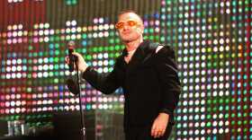 Bono on stage at the start of U2's "POPMART" tour.