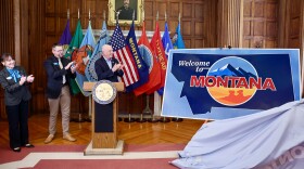 Gov. Gianforte (right), Dir. Dorrington (middle), and Dir. Bertoglio (left) unveiling Montana’s new highway welcome signs