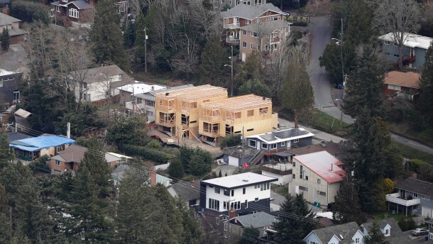 Homes are shown under construction, Friday, Feb. 23, 2018, south of Seattle, Wash. (AP Photo/Ted S. Warren)