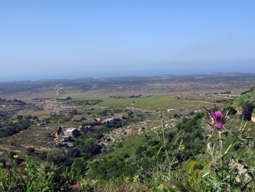 The ancient city looms over the Mediterranean.