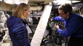 Ben Matthys (right) showcases different parts of the F/V Mirage’s engine room and new hybrid engine to Sen. Lisa Murkowski