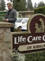 Tim Killian, a spokesman for Life Care Center in Kirkland, Wash., prepares to give a daily briefing to reporters on Wednesday.