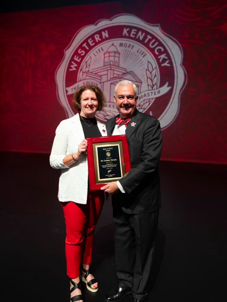 President Timothy C. Caboni presented the Spirit of WKU Award to Dr. Corinne Murphy.