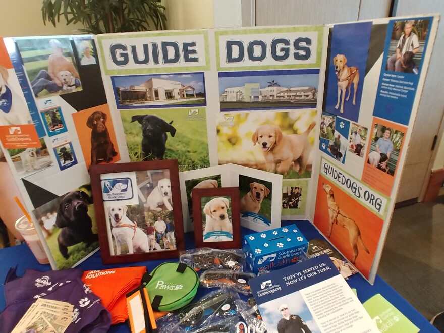 The new Puppy Raisers Club at USF Tampa recruited potential volunteers at a campus volunteer fair in September.