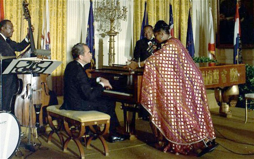 1974 Pearl Bailey w/ President Nixon tinkling the ivories (see Emperor Nero 0064 C.E.)