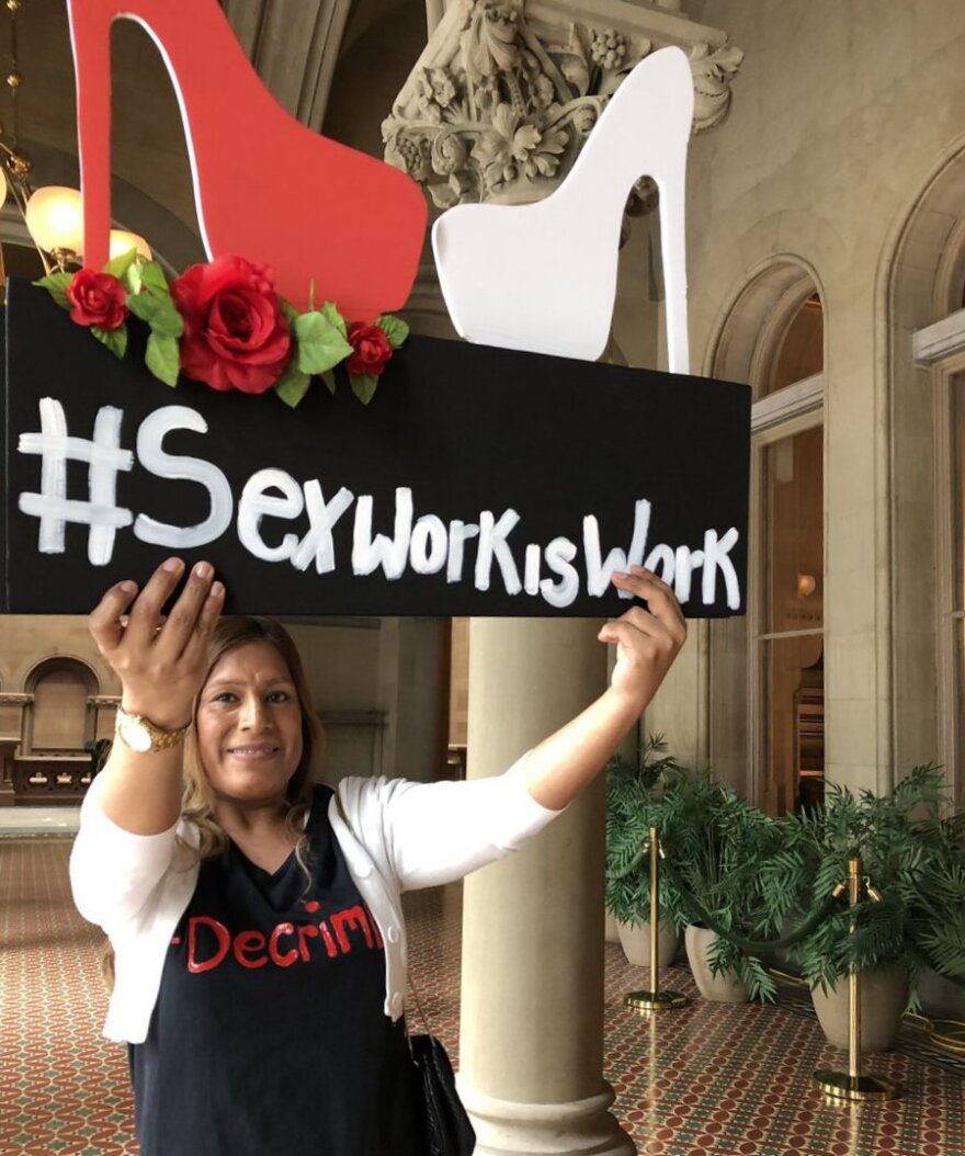 Sex workers rally in Albany Tuesday.