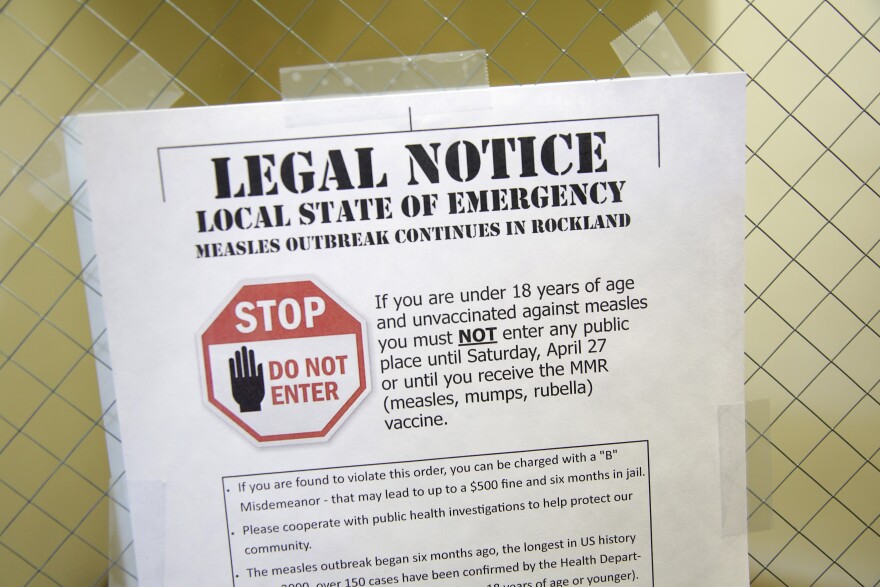 A sign at the Rockland County Health Department in Pomona, N.Y., explains the local state of emergency regarding a measles outbreak in March.