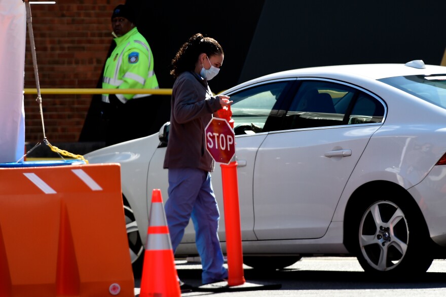 Hartford Hospital personnel during drive-through testing on March 24.