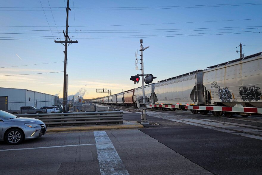 A freight train crosses 12th Street in Ogden, Dec. 18, 2025