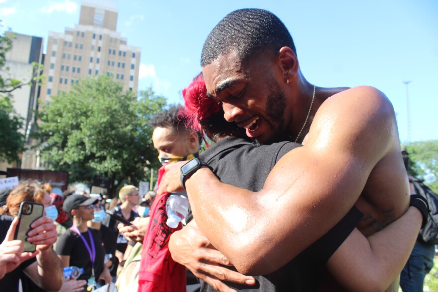 Trevor Taylor is a Freshmen English teacher at Wagner High School. Taylor spoke to the crowd of about 300 people in front of the San Antonio Police headquarters.