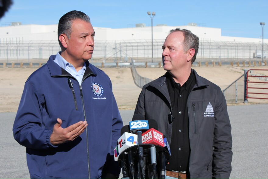 U.S. Sens. Alex Padilla and Adam Schiff speak to the media at an immigration detention center in California City on Jan. 20, 2026.