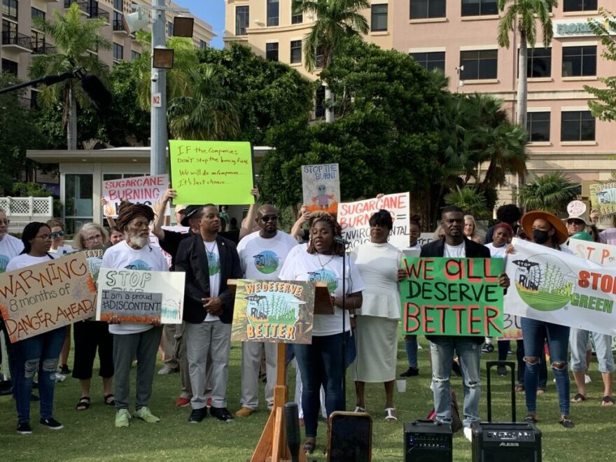 Residents at a rally organized by the Stop the Burn campaign in December 2022 at the headquarters of Florida Crystals Corporation in West Palm Beach, FL.