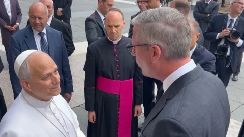 Pope Leo XIV speaks to Illinois State Treasurer Mike Frerichs in St. Peter's Square at The Vatican. Frerichs returned $8.65 of the Pope’s own money from the state’s unclaimed property system.