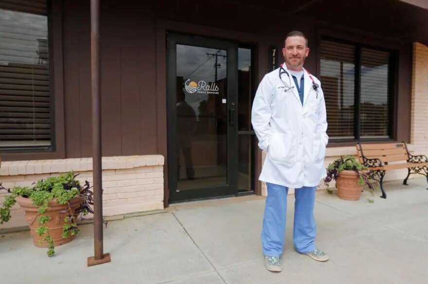 Family nurse practitioner John Hodges stands in front of his practice at Ralls Family Medicine on Sept. 1. Ralls is a small town about 30 miles east of Lubbock.