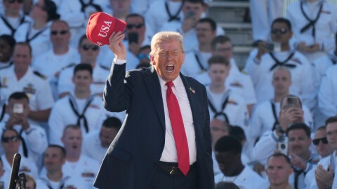 President Donald Trump arrives to speak during a celebration for the 250th anniversary of the U.S. Navy aboard the USS Harry S. Truman at Naval Station Norfolk, Sunday Oct. 5, 2025 in Norfolk, Va.