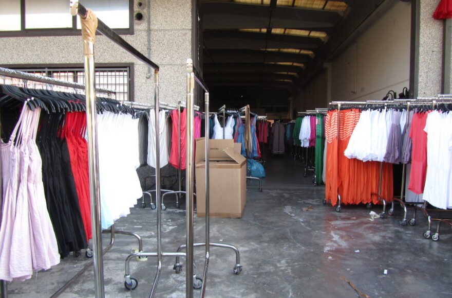 At the Macrolotto industrial park, home of <em>pronto moda</em> — or fast fashion — warehouse after warehouse is filled with racks of low-end, trendy women's garments.