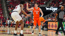 Syracuse’s Joe Girard III (11, Orange) directs traffic in a 70-69 win at Louisville on January 3, 2023.