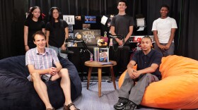 A Media Lab team gathers after interviewing author Nicholas Day. Standing, from left: Vanya Williams, Evelyn Gonzalez-Perez, Josiah Pagan, Au'dahcey Hickson. Sitting, from left: Nicholas Day, Davien Landrau.