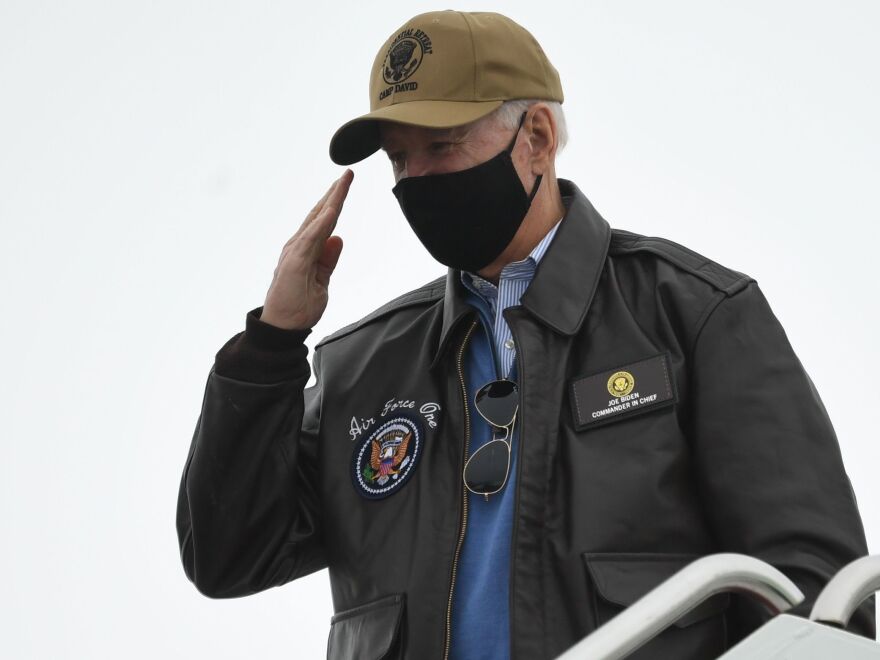 US President Joe Biden boards Air Force One prior to departure from Hagerstown Regional Airport in Hagerstown, Maryland, February 15, 2021