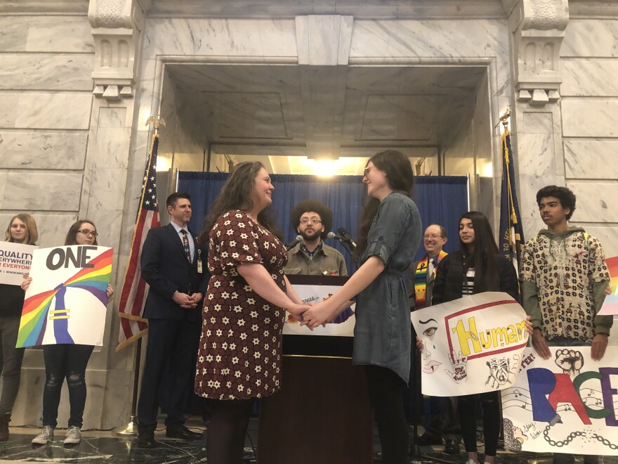 A couple exchanges wedding vows in the Kentucky Capitol rotunda following the anual Fairness Rally on February 26, 2019.