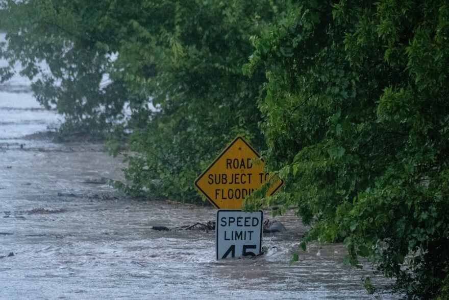 The Pedernales River floods along State Highway 16 on Thursday, July 16, 2026, in Fredericksburg, Texas.
