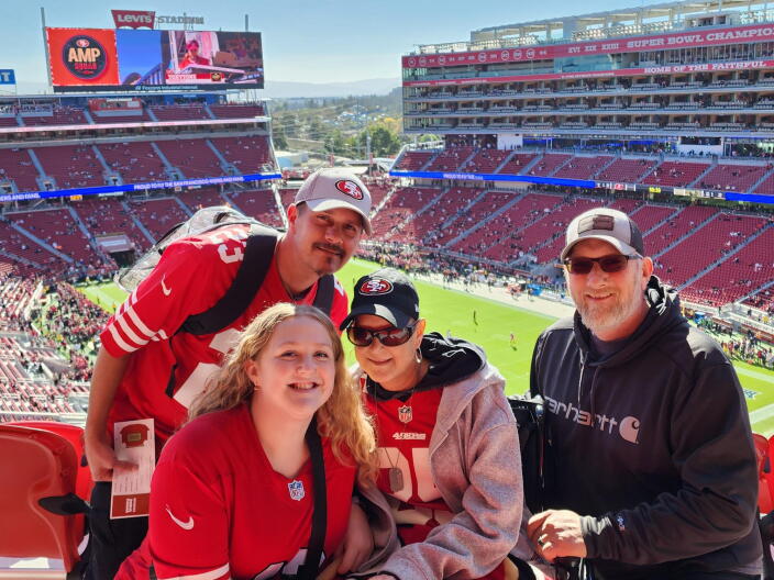 Dawnel Towery and her family at a San Francisco 49ers game.