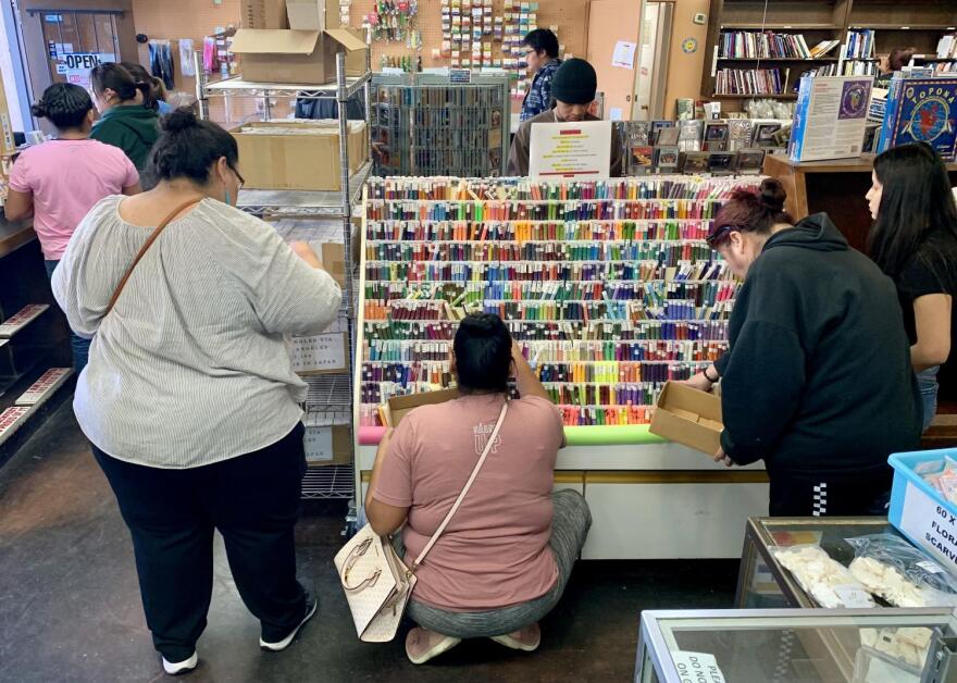 Native shoppers in search of clearance sales on leftover inventory at Drumbeat Indian Arts on Saturday, Jan. 27.