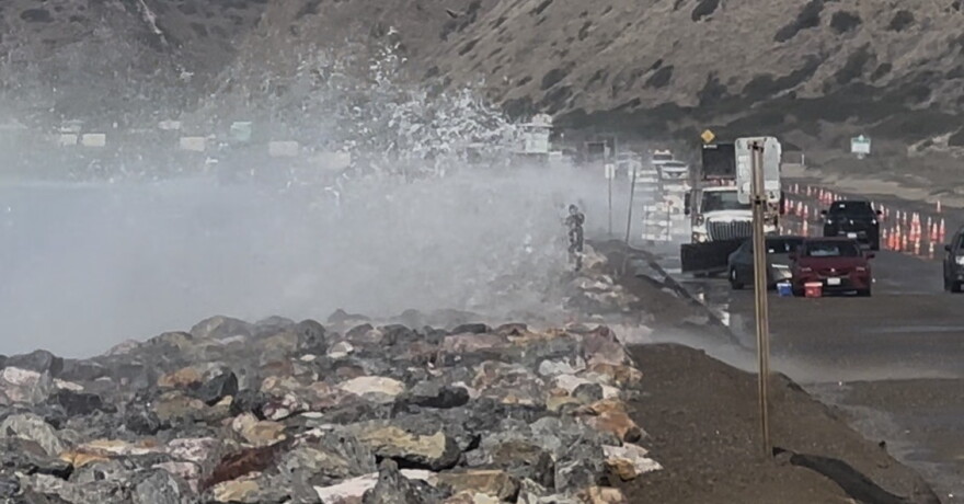 Surf crashing onto a section of the Pacific Coast Highway just northwest of Sycamore Cove Beach in Ventura County.