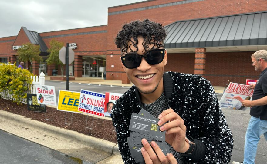Monty Bynum figured a Super Tuesday polling place in suburban Raleigh would be a perfect place to promote his music business. NPR/Tamara Keith