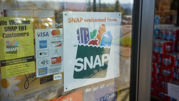 Portland, OR, USA - Oct 28, 2020: "SNAP welcomed here" sign is seen at the entrance to a Big Lots store in Portland, Oregon. The Supplemental Nutrition Assistance Program (SNAP) is a federal program.