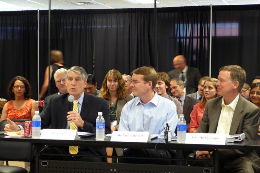 Senator Mark Udall (D-Colo), Senator Michael Bennet (D-Colo) and Governor John Hickenlooper take part in a business and innovation roundtable in Louisville Friday.