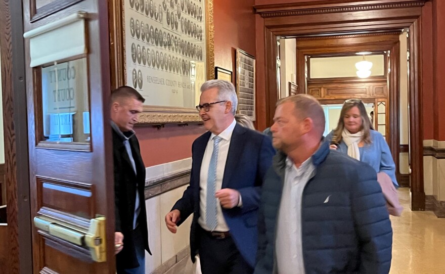 County Executive Steve McLaughlin enters the Rensselaer courtroom as his trial begins.