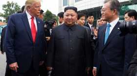 President Donald Trump meets with North Korean leader Kim Jong Un and South Korean President Moon Jae-in, right, at the border village of Panmunjom in the Demilitarized Zone, South Korea, Sunday, June 30, 2019.