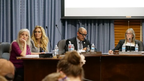 School board members Jeanette Wilson, Candy Olson, Superintendent Juan Cabral and board president Michelle Rendler at the August 19 meeting.