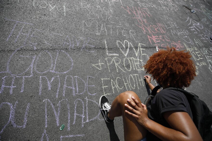Protesters wrote messages of hope and anger on the new Black Lives Matter Plaza in response to the death of George Floyd and against police brutality in Washington, D.C.
