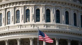The American flag flies at the U.S. Capitol in Washington, DC.