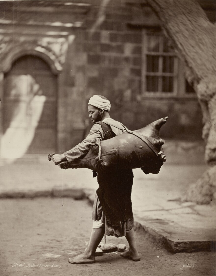 <em>Water Carrier, Cairo</em>, c. 1875.
