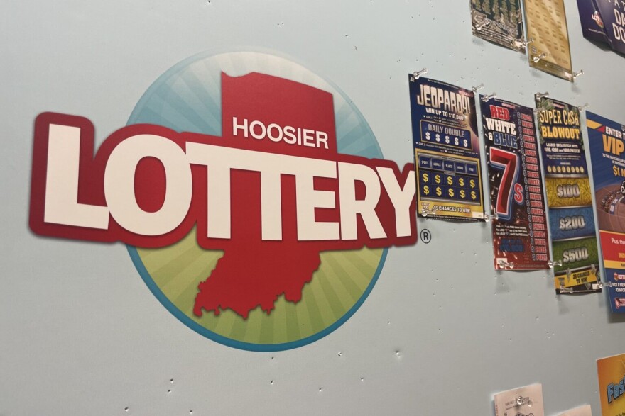 Several game tickets are pinned to a Hoosier Lottery bulletin board at the organization's downtown Indianapolis headquarters in May 2025.