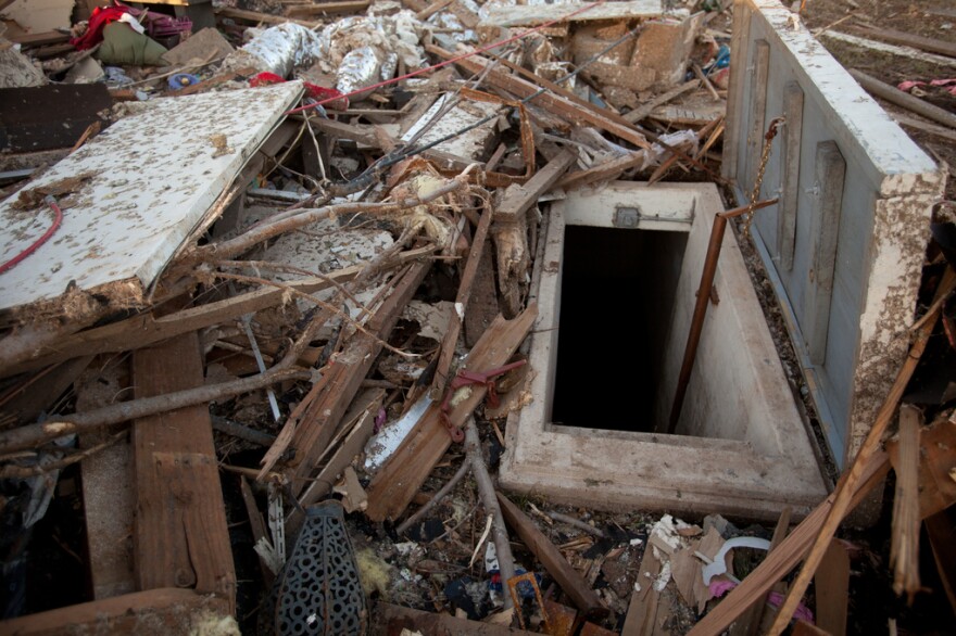 A storm shelter used during the May 2013 tornado in Moore, Oklahoma. The shelter door was minimally damaged and all inside survived.