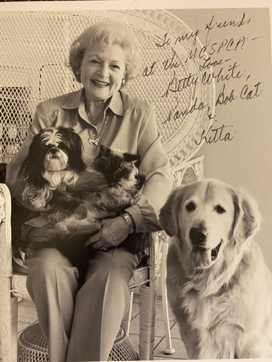 White signed this photograph for the SPCA Monterey County team.