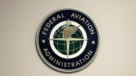 A Federal Aviation Administration sign hangs in the tower at John F. Kennedy International Airport in New York, March 16, 2017.