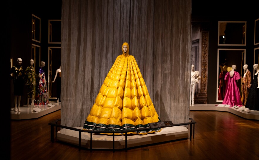 A tapered down coatdress from 2019, designed by Pierpaolo Piccioli for the Moncler fashion house is one of the showstoppers in the Cleveland Museum of Art exhibition, “Renaissance to Runway.’’