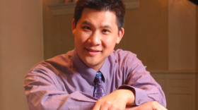 Ching-chu Hu wearing a lavender dress shirt